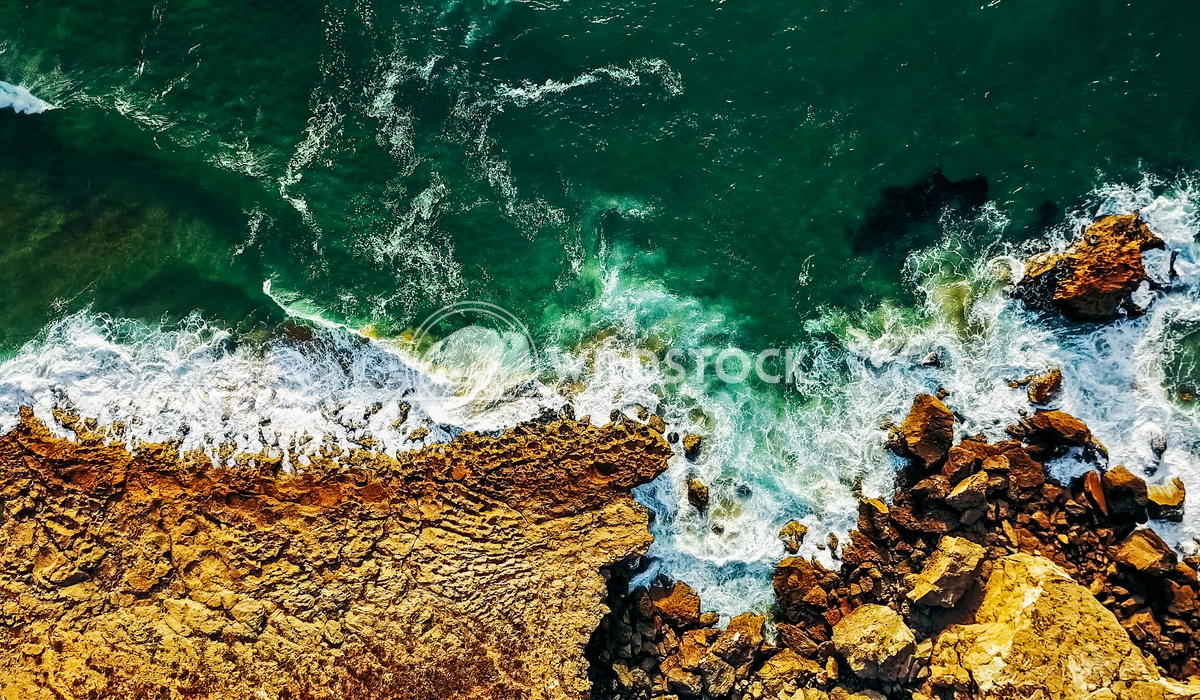 Aerial View From Flying Drone Of Ocean Waves On Rocky Beach Landscape Radu Bercan Aerial View From Flying Drone Of Ocean